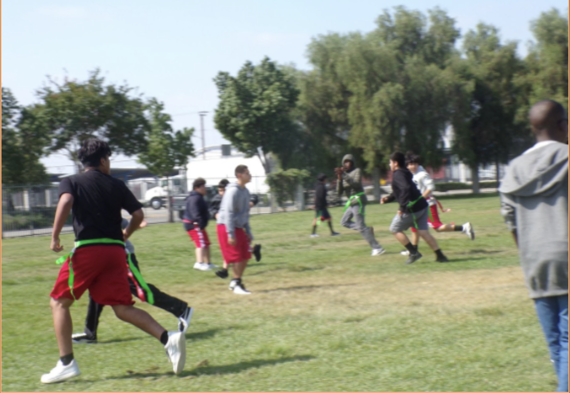Flag football players playing flag football