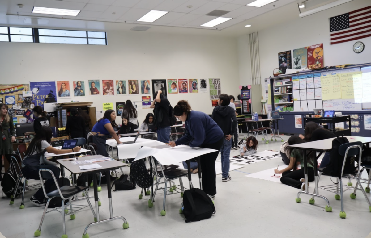 Leadership working on posters for upcoming events