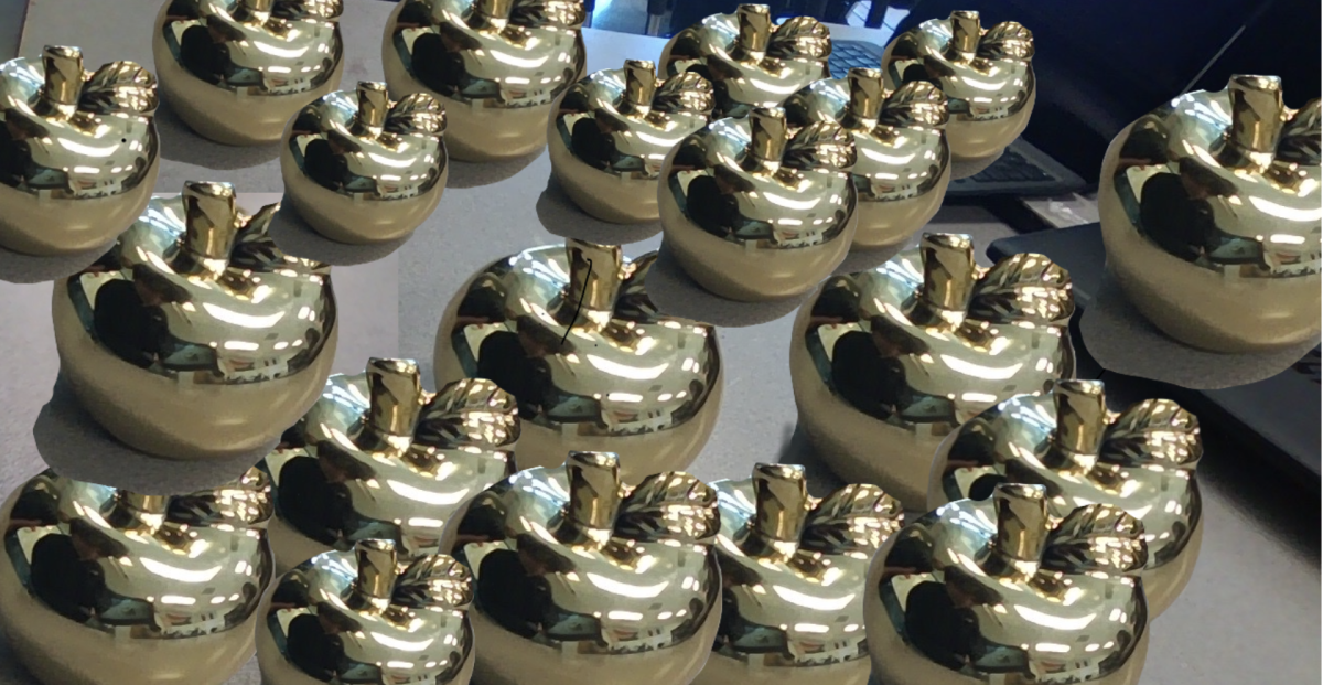 A visual example of the 20 golden apples that have been awarded to teachers.
(Photo manipulation used)