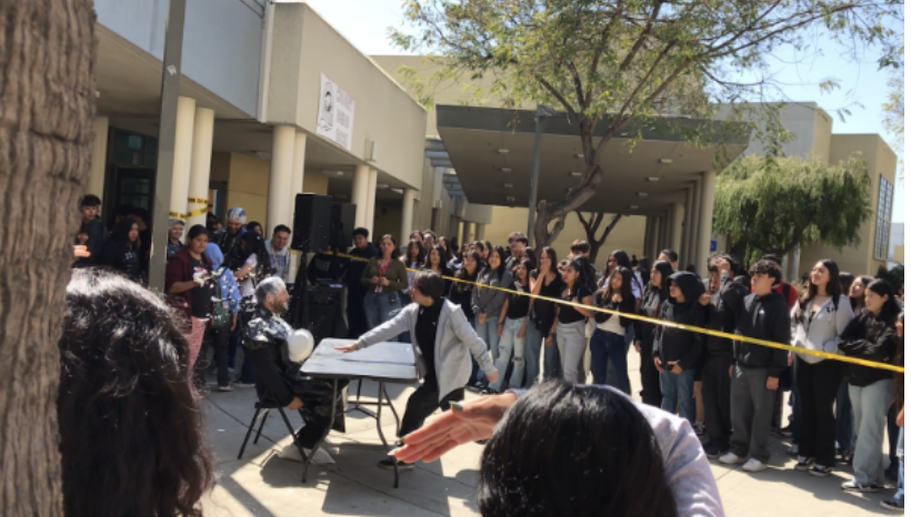 Mr. Valenzuela getting a pie launched at him by anonymous student
