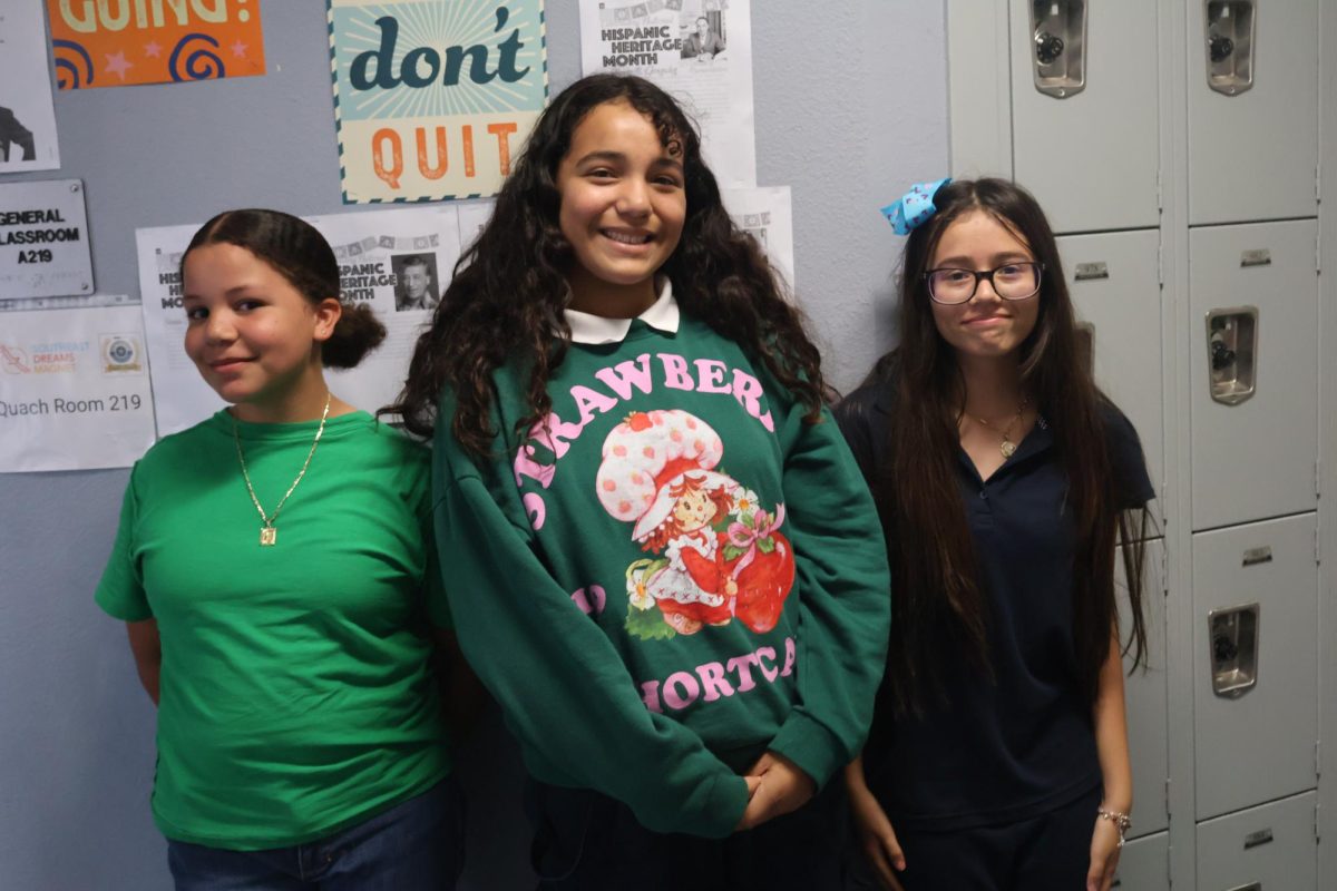 Students participating in Hello Week activities by wearing green