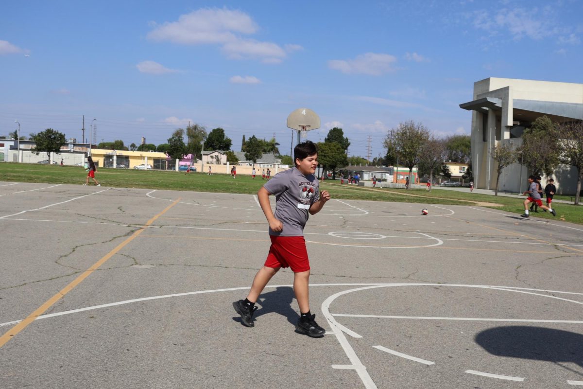 Kid running the PACER 